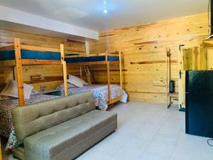 Postel nebo postele na pokoji v ubytování Rimusa Inn