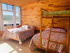 Postel nebo postele na pokoji v ubytování Rimusa Inn