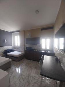 Postel nebo postele na pokoji v ubytování AURY HOME -Corso XX Settembre