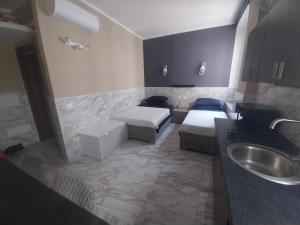 Postel nebo postele na pokoji v ubytování AURY HOME -Corso XX Settembre