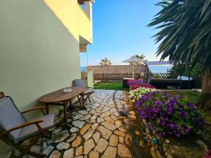 Vonkajšia záhrada v ubytovaní Corfu Glyfada Menigos Resort 59