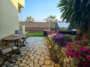 Vonkajšia záhrada v ubytovaní Corfu Glyfada Menigos Resort 59