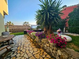 Vonkajšia záhrada v ubytovaní Corfu Glyfada Menigos Resort 59