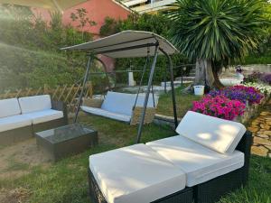 Vonkajšia záhrada v ubytovaní Corfu Glyfada Menigos Resort 59