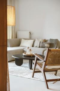 a living room with a couch and a coffee table at Appartement in Antwerpen in Antwerp