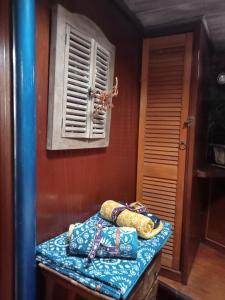 a room with a counter with some bags on it at Bateau de pirates in Gruissan +25 photos
