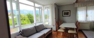 A seating area at Apartamentos El Jornu