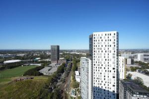 an aerial view of a city with tall buildings at Superior View APT in heart of Sydney Olympic Park in Sydney