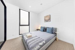 Katil atau katil-katil dalam bilik di Adorable 2B Apt near Macquarie Uni