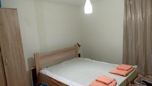 Postel nebo postele na pokoji v ubytování Jela Apartman