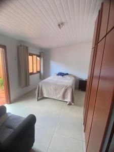 Postel nebo postele na pokoji v ubytování Quarto em Foz do Iguaçu