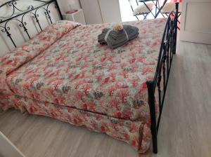 Postel nebo postele na pokoji v ubytování Il rifugio sul Porto