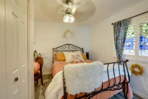a bedroom with a bed and a window at Cozy Reno Vacation Rental Less Than 1 Mi to Midtown! in Reno