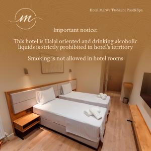 Кровать или кровати в номере Hotel Marwa Tashkent Pool&Spa