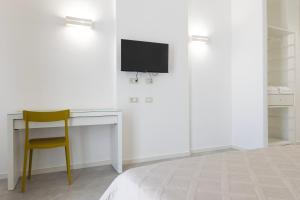 TV a/nebo společenská místnost v ubytování Sa Pasadina