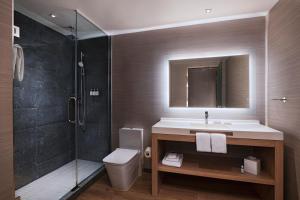 Koupelna v ubytování AC Hotel Houston Downtown + 37 fotografií