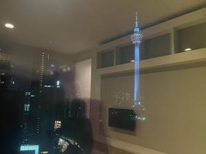 a room with a view of the shanghai tower at The Platinum Suites KLCC By World Luxury in Kuala Lumpur