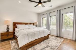 a bedroom with a bed and a ceiling fan at Modern Atlanta Vacation Rental 2 Mi to Downtown! in Atlanta
