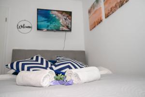 Postel nebo postele na pokoji v ubytování Blue apartment with FREE parking