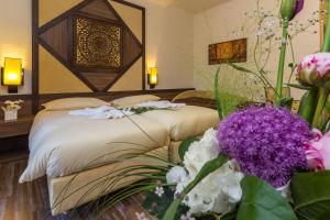 Letto o letti in una camera di Hotel Riviera