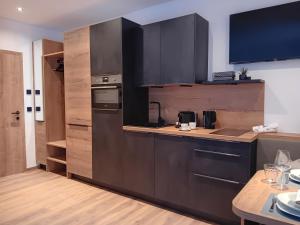 Eldhús eða eldhúskrókur á Feiserhof Navis - Appartements