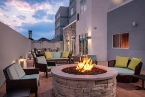 a fire pit on the patio of a hotel at Fairfield Inn & Suites by Marriott Harrisburg International Airport in Middletown