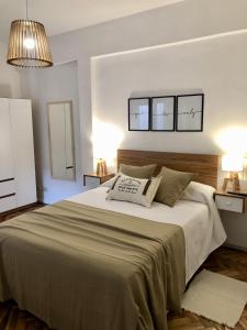 Llit o llits en una habitació de Square Studio- Las Cañitas-Palermo
