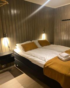 Postel nebo postele na pokoji v ubytování Vega Havhotell + 2 fotografie