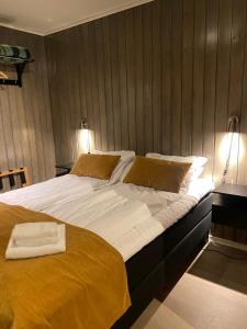 Postel nebo postele na pokoji v ubytování Vega Havhotell