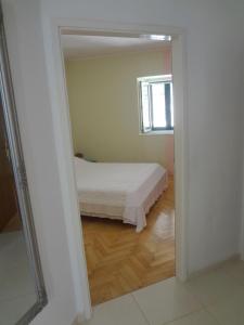 Posteľ alebo postele v izbe v ubytovaní Villa Dijana