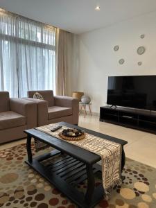 Area tempat duduk di The Perfect Cozy Home For You