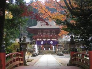 a large building with a gate in a park at Misato no Yu Kajikaso - Vacation STAY 22199v in Kimino