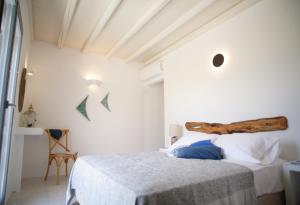 Postel nebo postele na pokoji v ubytování Krotiri View Paros