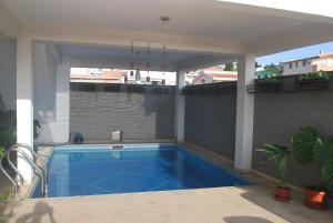 a swimming pool on top of a building at Apartments Stevanović in Dobra Voda