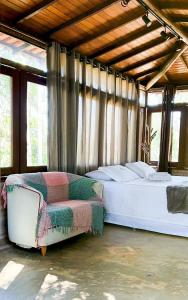 Ένα ή περισσότερα κρεβάτια σε δωμάτιο στο Estância Peti