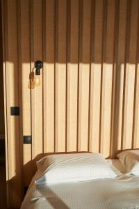 Een bed of bedden in een kamer bij La ferme de Brouage - Gite #1