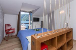 TV o dispositivi per l'intrattenimento presso Hotel Riviera