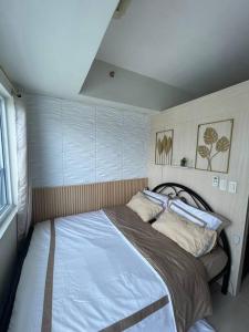 Krevet ili kreveti u jedinici u objektu Makati Luxury Retreat with Wi-Fi and Netflix