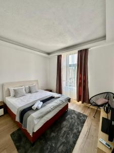 Postel nebo postele na pokoji v ubytování Apartments Ejla&Una