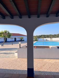 a view of a swimming pool from a building at Alojamento do Monte in Estremoz