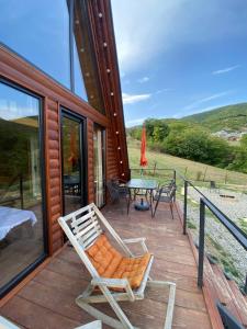 En balkong eller terrass på Cozy cabin