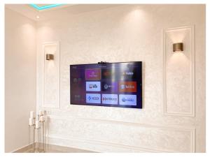 TV a/nebo společenská místnost v ubytování Appartement de luxe Al hoceima