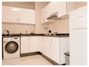 Kuchyň nebo kuchyňský kout v ubytování Appartement de luxe Al hoceima