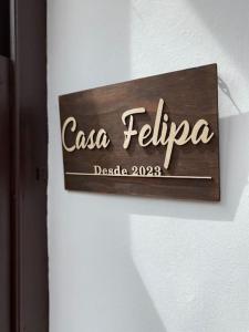 a sign that says casa fiesta on a wall at NUEVO apartamento céntrico Casa Felipa in Zamora