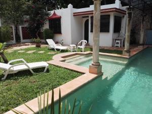 Bazén v ubytování Casa Hacienda Itzimna nebo v jeho okolí