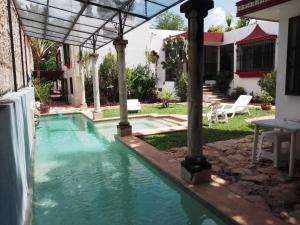 Bazén v ubytování Casa Hacienda Itzimna nebo v jeho okolí