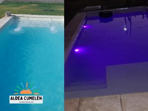 uma piscina roxa com luzes num quintal em Aldea Cumelén em Campos Salles