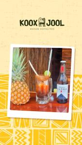 a picture of a pineapple and a drink and a bottle at Hotel Koox Jool Bacalar in Bacalar