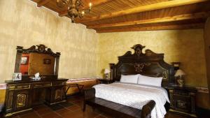 Postel nebo postele na pokoji v ubytování Villa Claus Inn