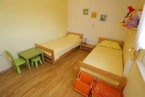 Ein Bett oder Betten in einem Zimmer der Unterkunft Sea View Apartments Pericic